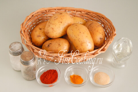 Картофель, подсолнечное масло, паприка, сушёный чеснок, куркума, соль и молотый перец на столе