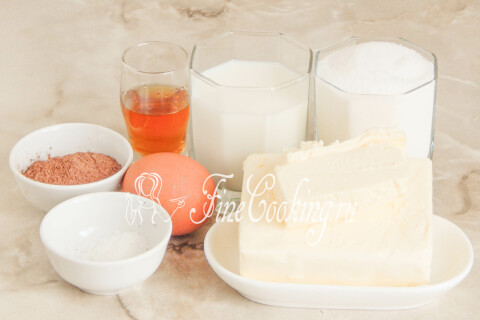 Продукты для крема Шарлотт: сливочное масло, сахар, молоко, яйцо и какао-порошок